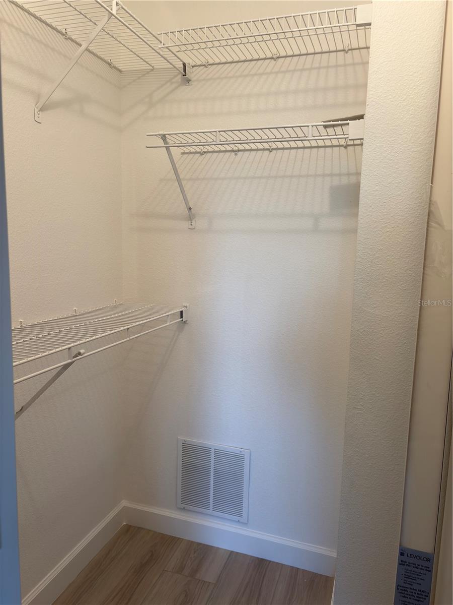 Walk in closet with built in drawers