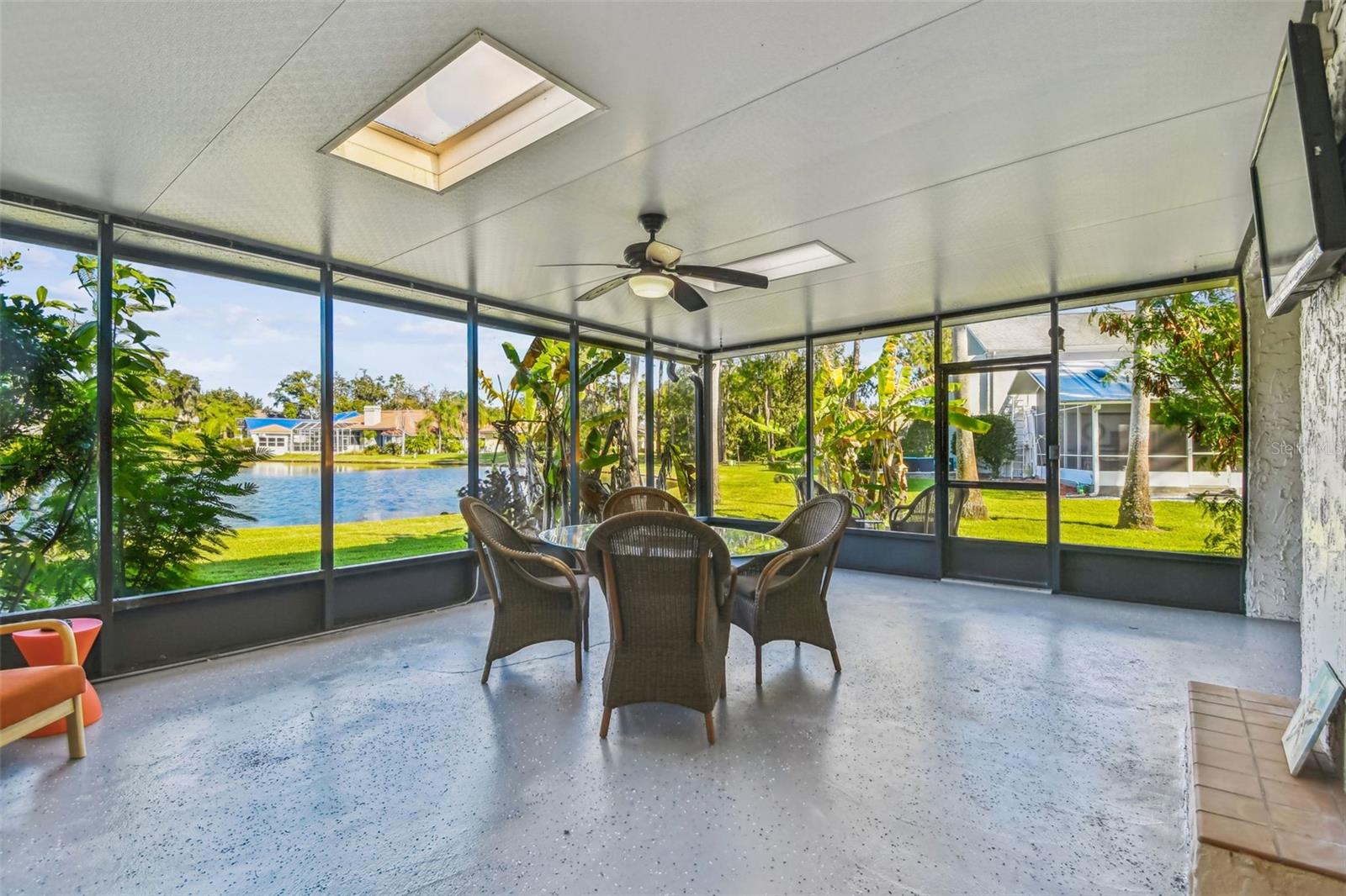 Screened lanai with view of the Lake