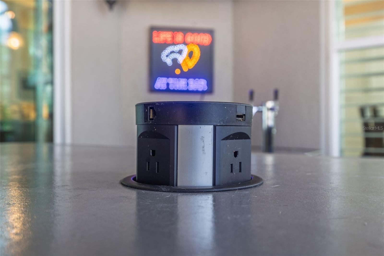 Pop-Up outlet in outdoor bar counter