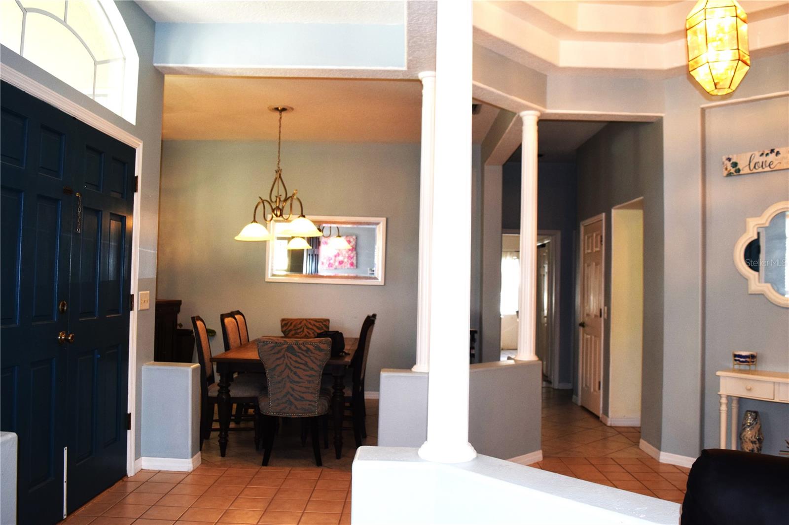 View of foyer and dining room from entry way