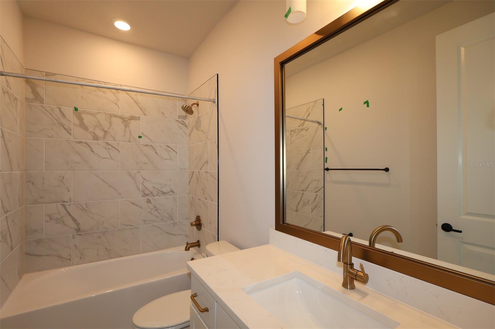 Secondary Bath **Photos are of a Similar Home