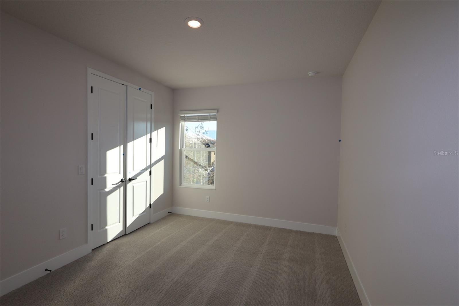 Secondary Bedroom **Photos are of a Similar Home