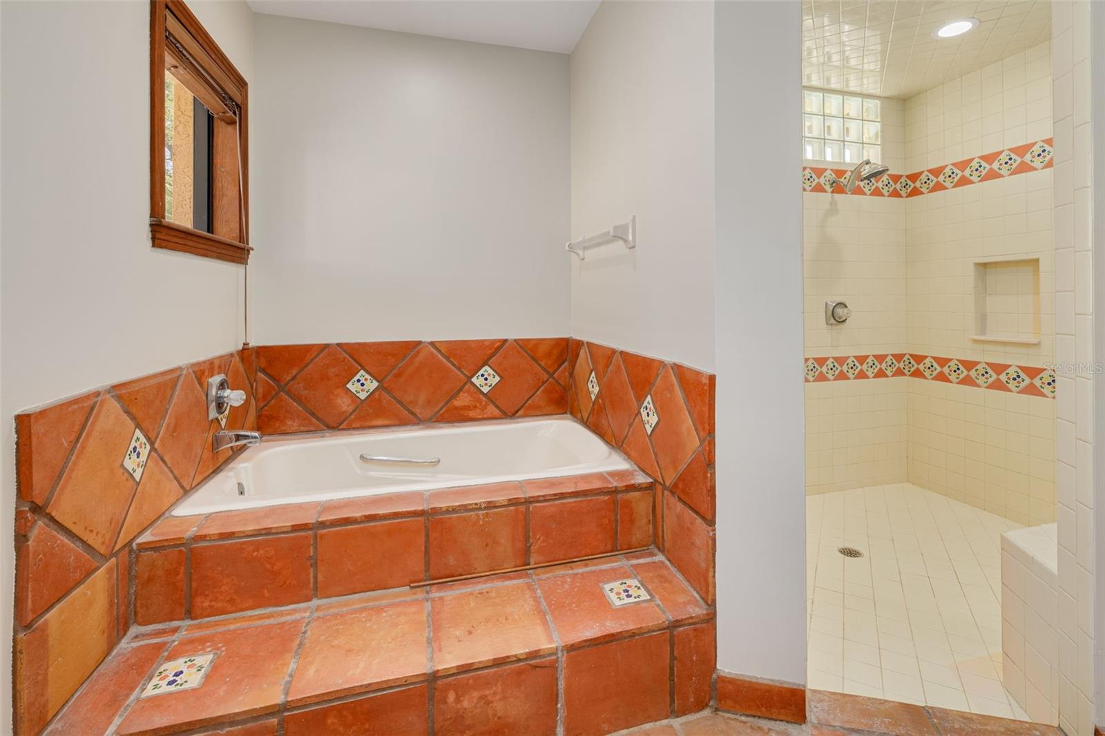 Primary Soaking Tub and Seperate Shower