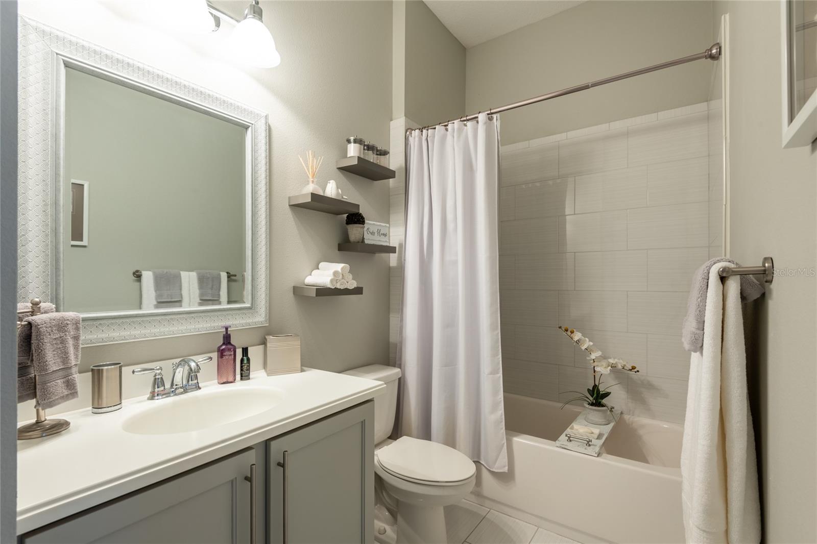 Full bath by the 2nd bedroom-first floor.