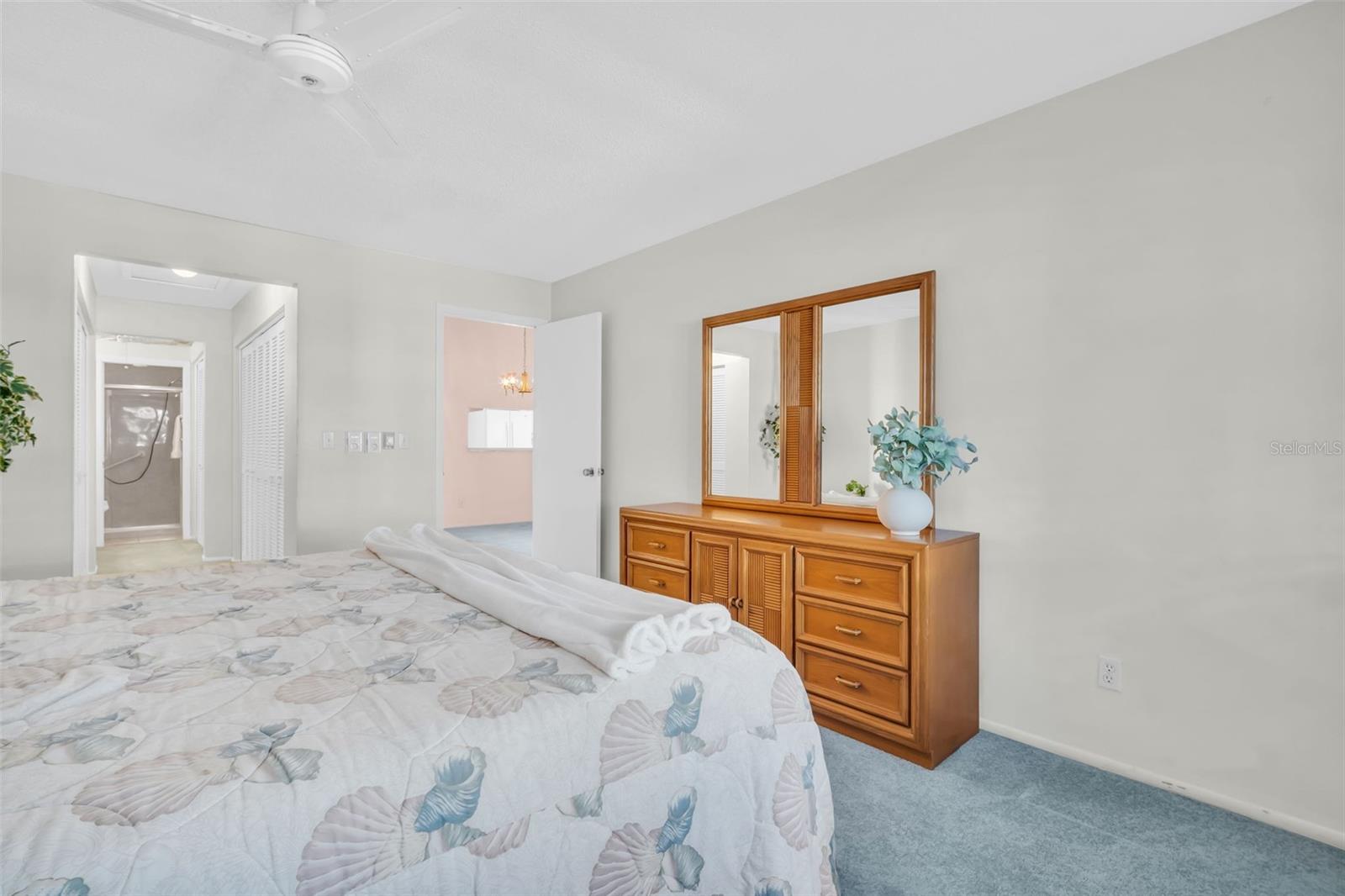 Master hall leads to private & updated en-suite bath~