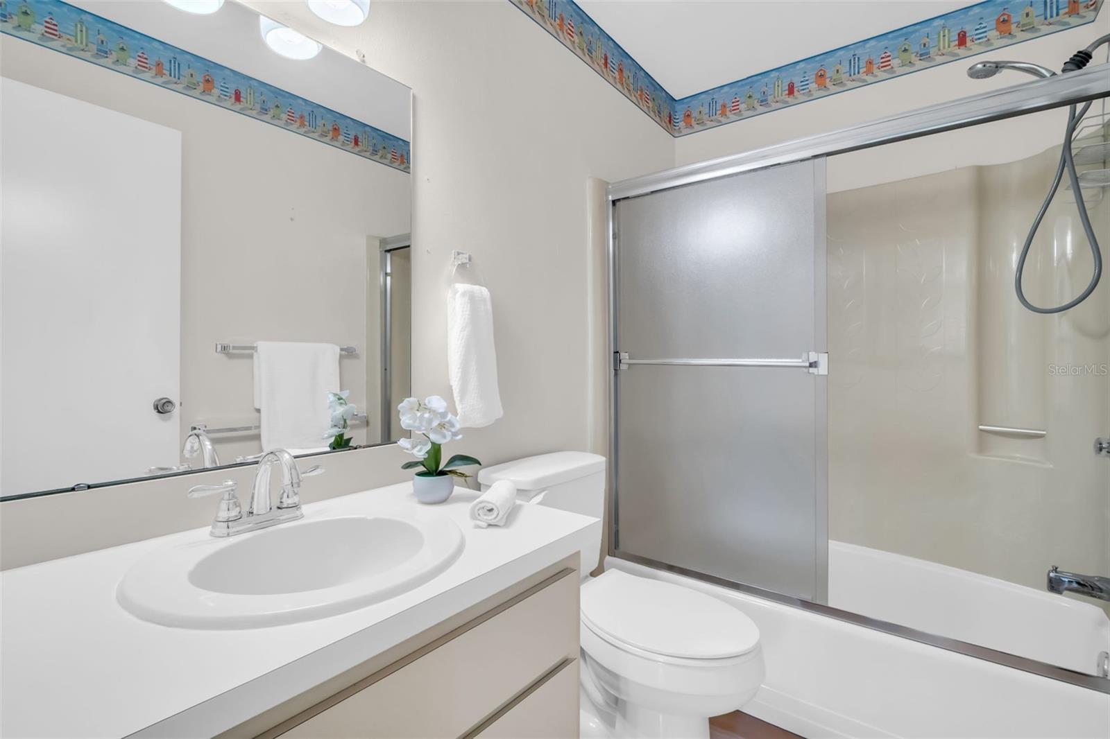 Hall bath positioned between 2nd bedroom & main living with tub/shower combo~