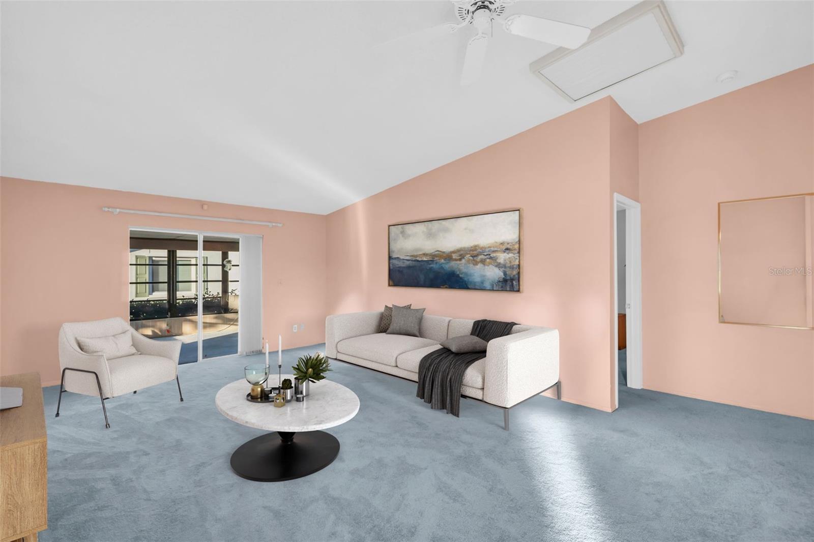 Main living opens to fully enclosed lanai with separate AC wall unit making the perfect office/craft room or bonus year-roud retreat~