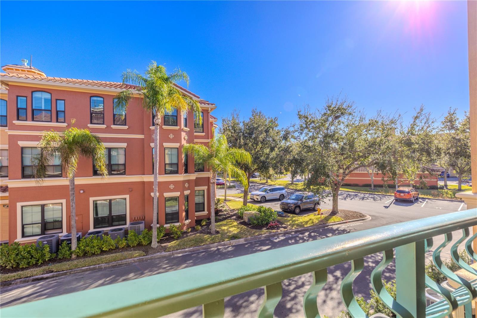 Spa-inspired primary en-suite bathroom featuring a double vanity with light stone countertops, a soaking tub, a walk-in glass shower, and bright coastal accents for a clean, relaxing retreat.