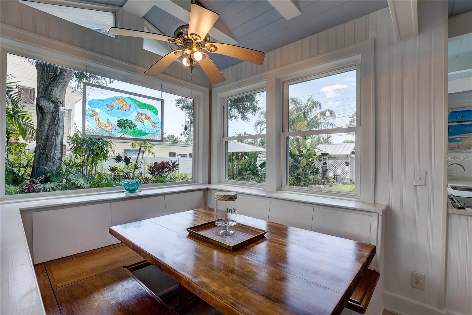 Booth with storage along and under seats