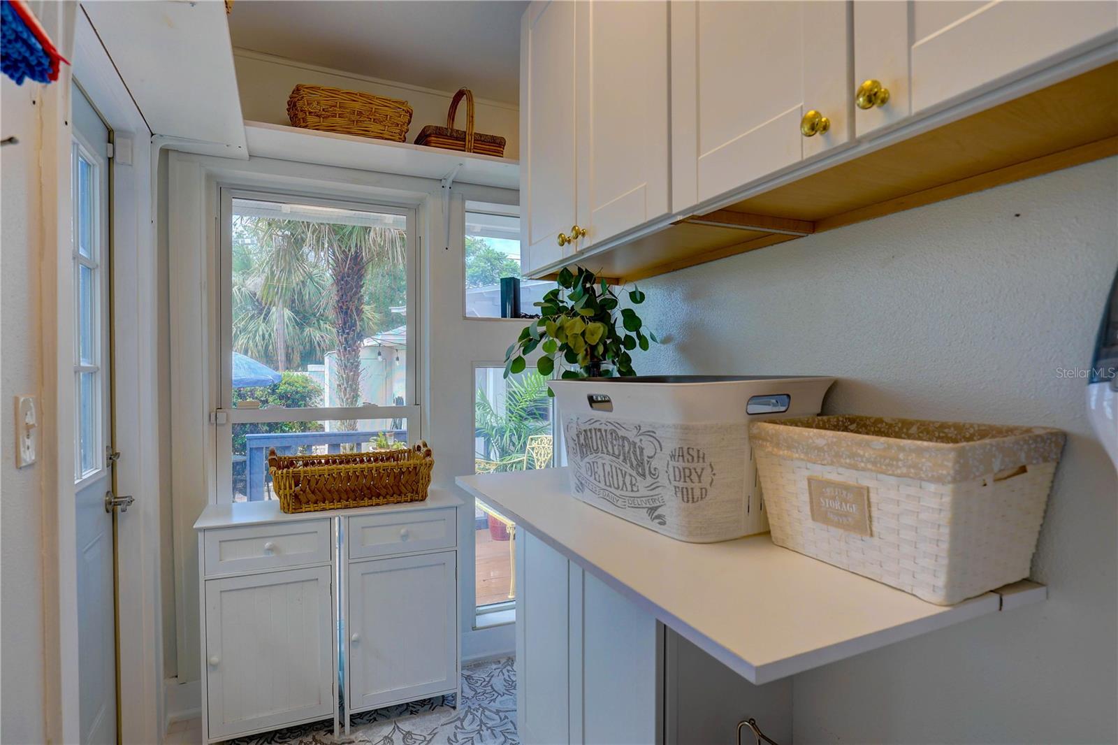 Laundry with cabinets