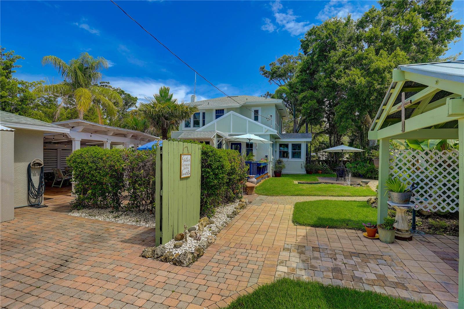 Garden sheds on right, Guest quarters on left.