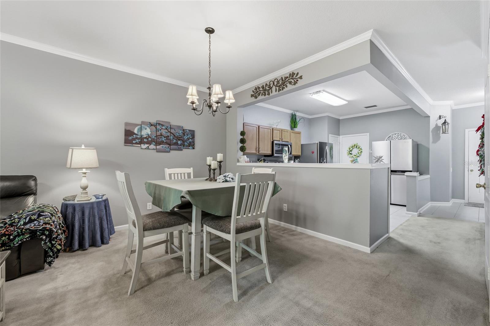 Dining area with view into kitchen