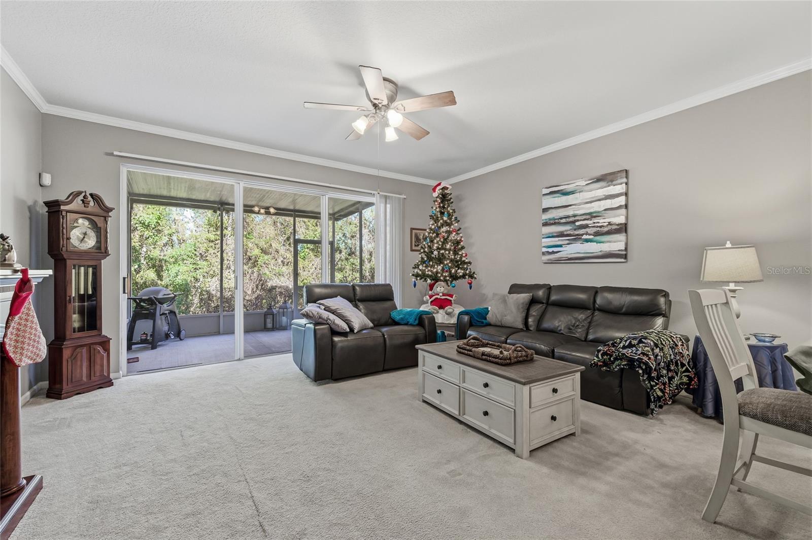Living room that leads out to screen in porch