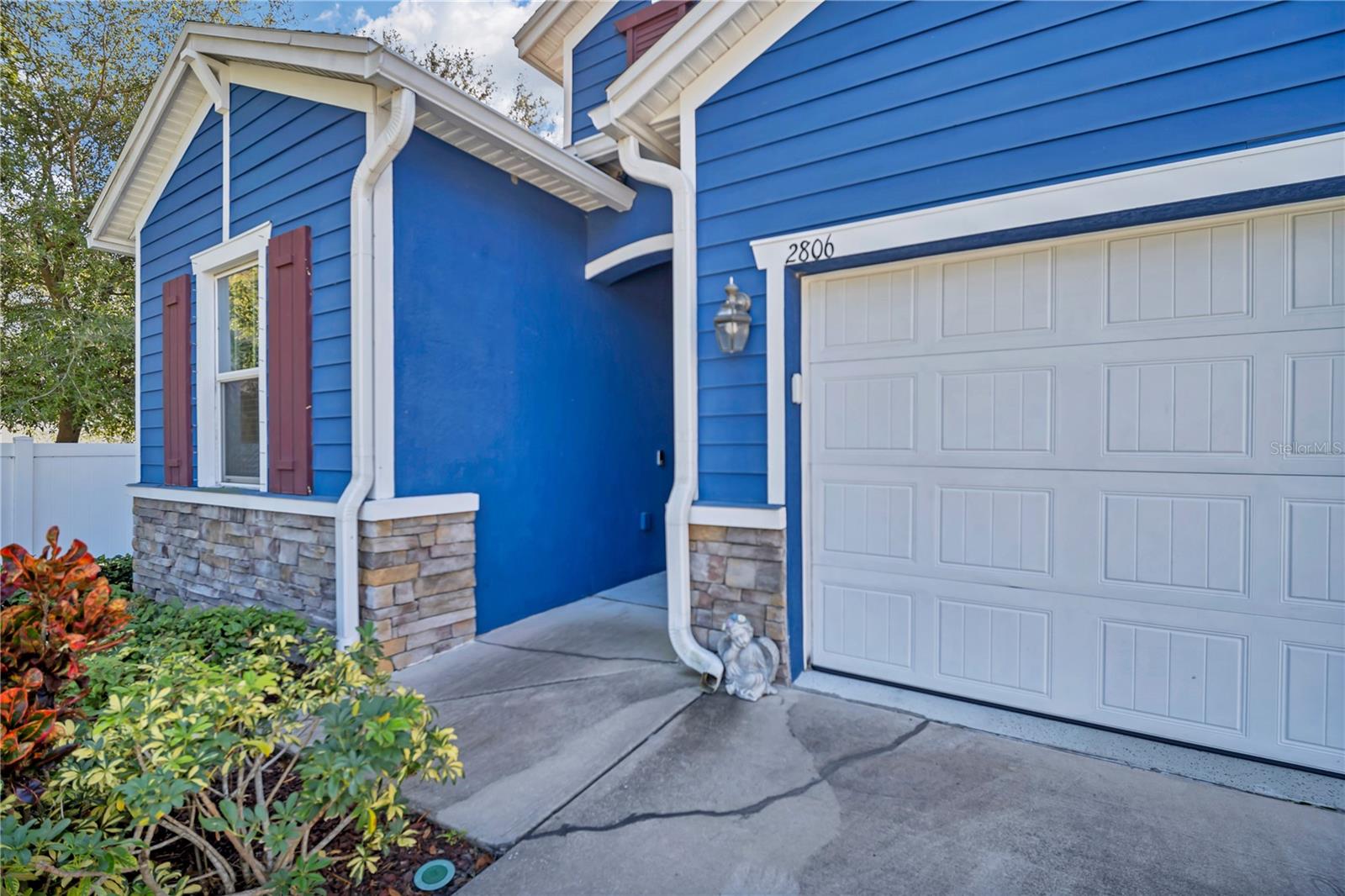 PROPERTY FRONT WITH ATTACHED GARAGE