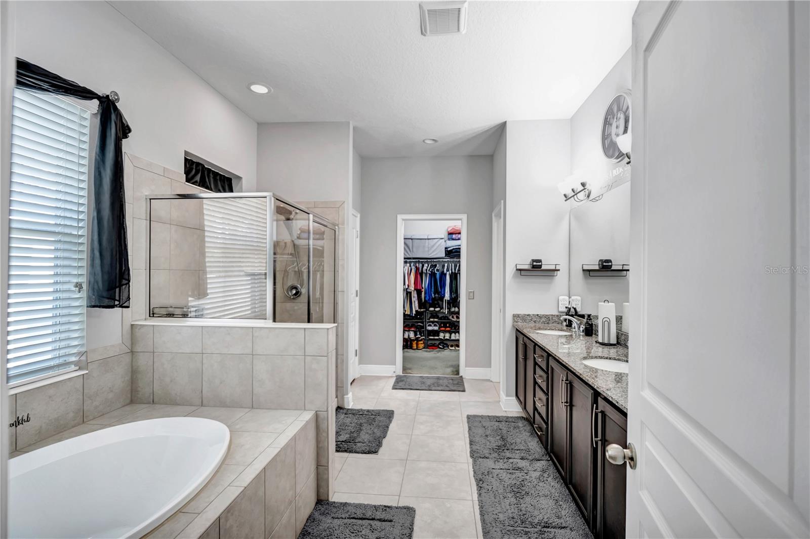 ENSUITE GARDEN TUB AND SEPARATE STANDING SHOWER WITH GLASS DOOR