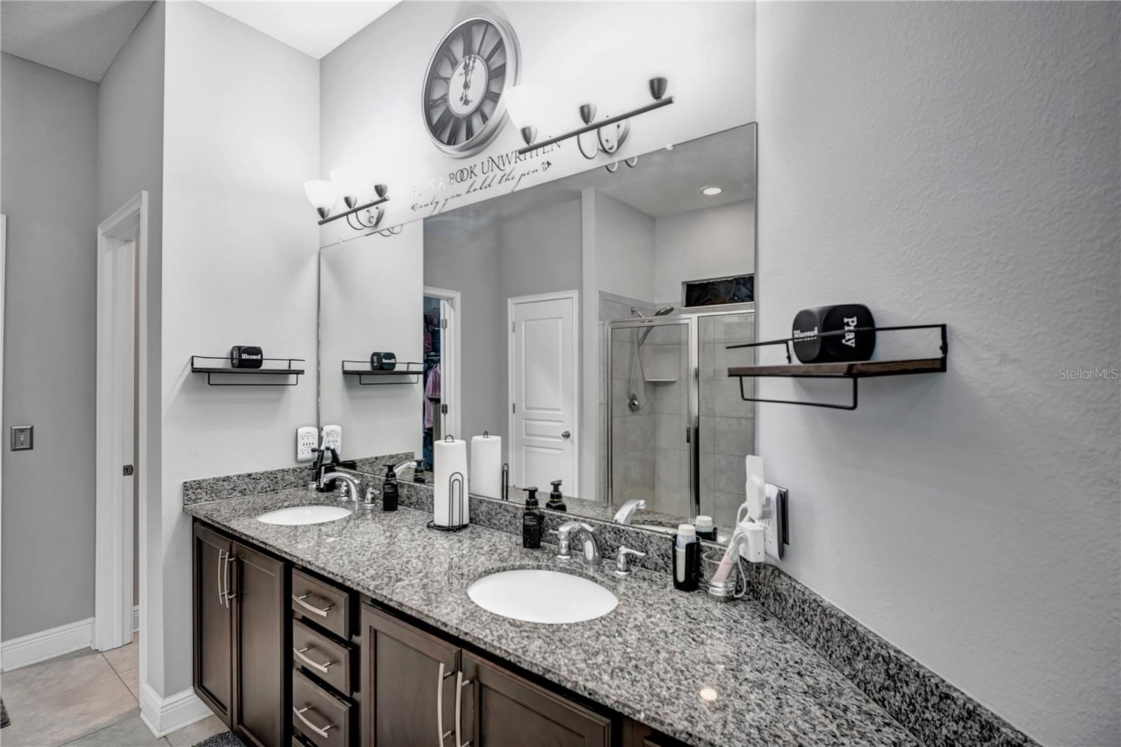 ENSUITE MASTER BATHROOM WITH GRANITE COUNTERTOP AND DOUBLE SINKS
