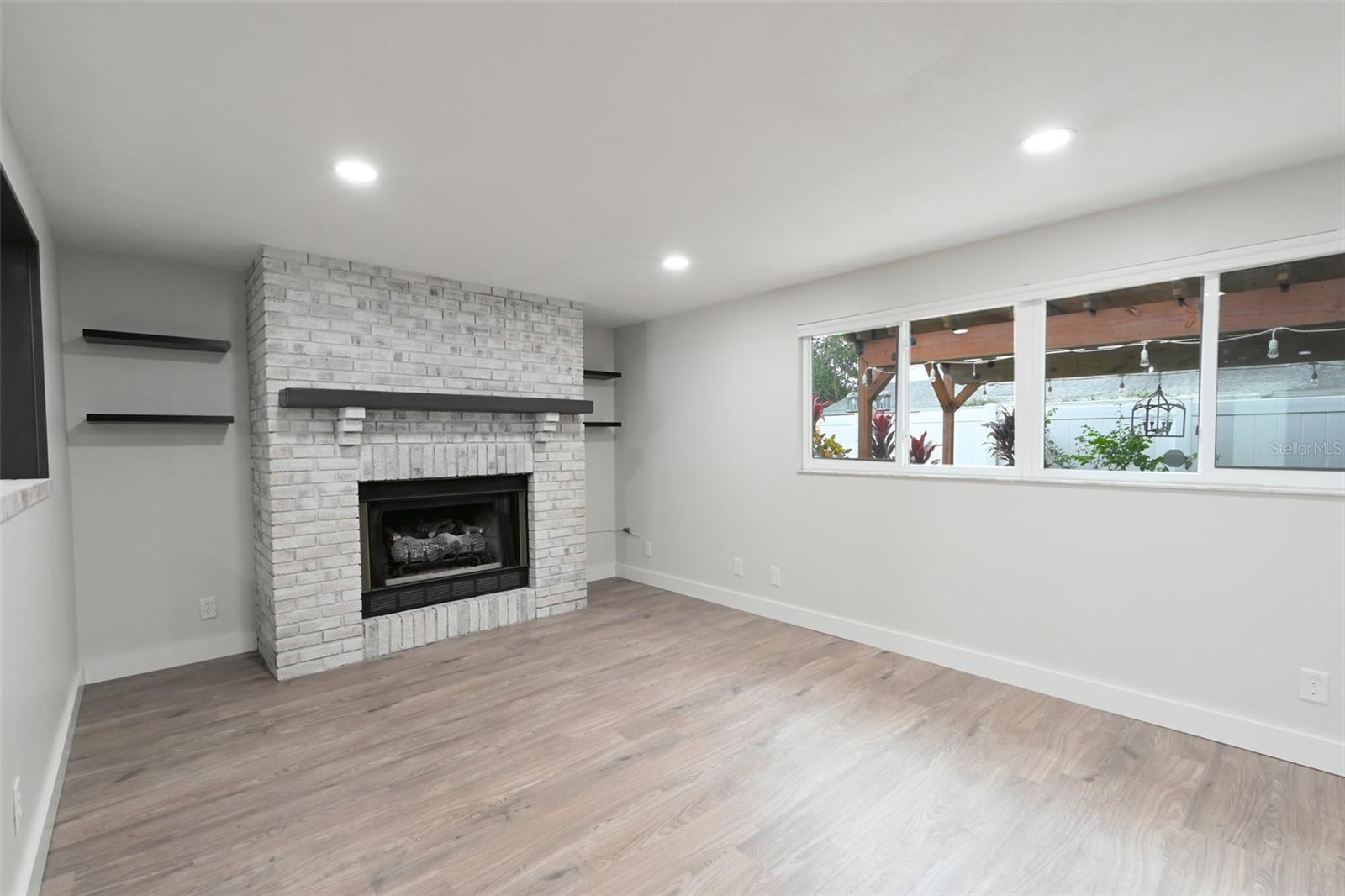 Left side of Family room area with gas fire place.