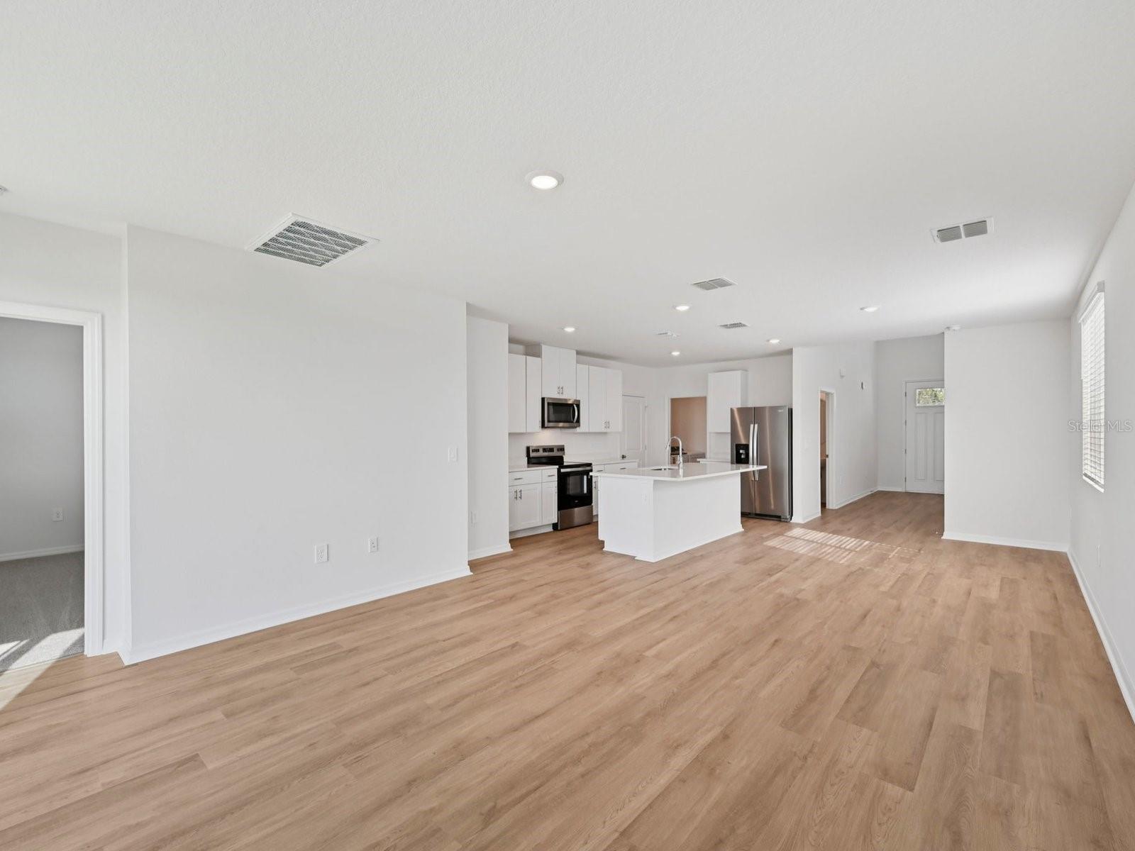 Interior photos are not of the actual home but are photos of the builder home with same floorplan with similar interior finishes and features.