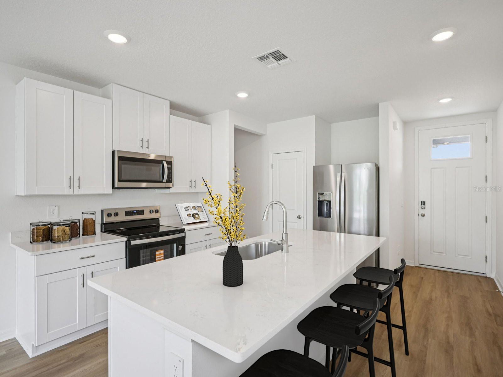 Interior photos are not of the actual home but are photos of the builder home with same floorplan with similar interior finishes and features. Photo has virtual staging.