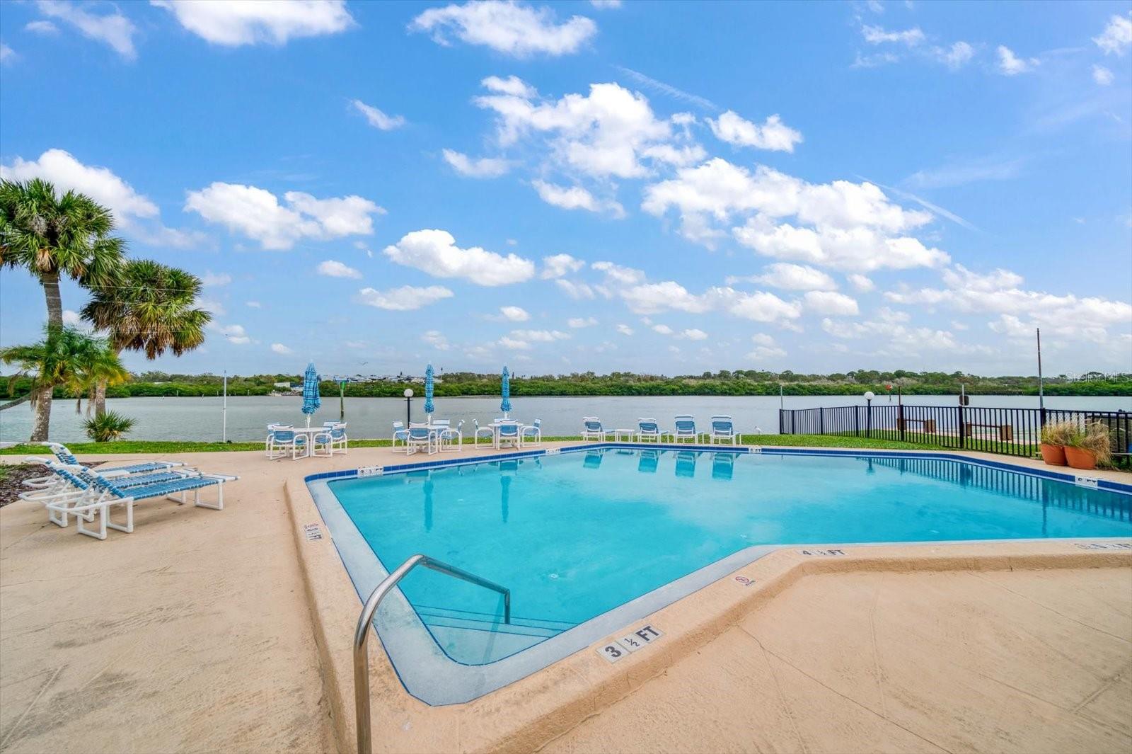 This pool is exquisite! Enjoy the relaxation and convenience, just steps from the condo.