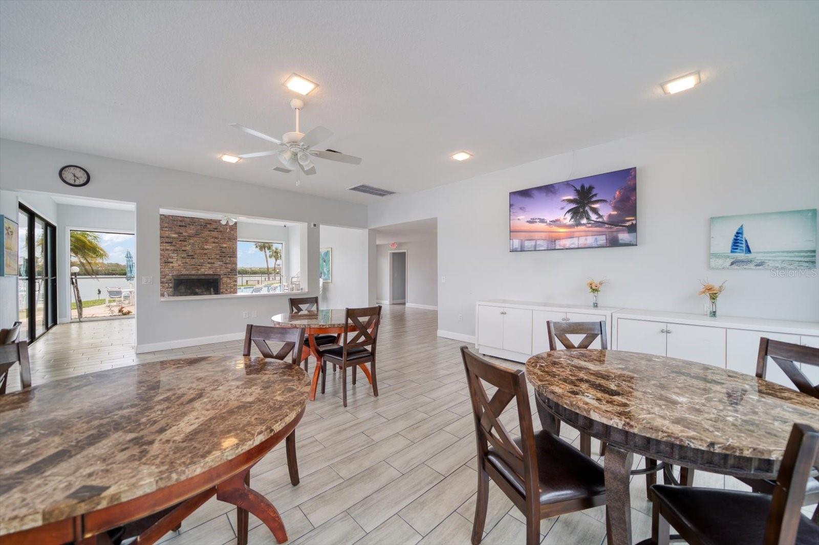 Clubhouse opens to the pool area.