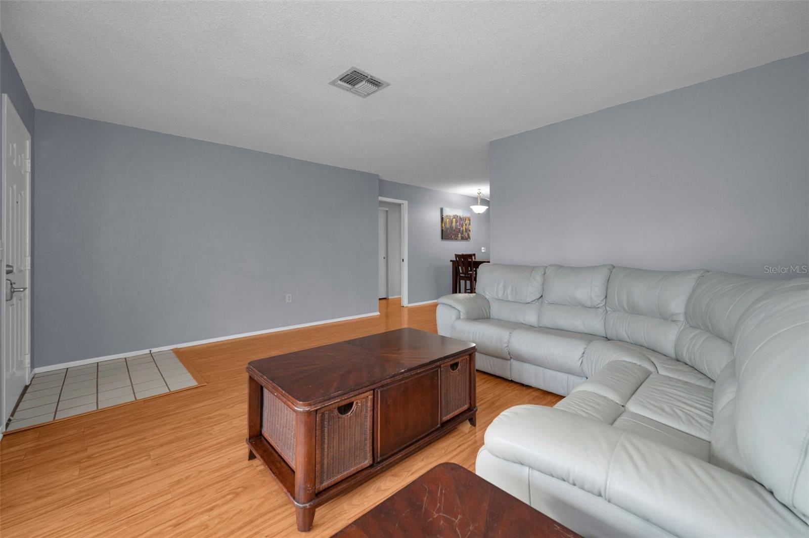 Living Room with Doorway to Guest Suite Hallway