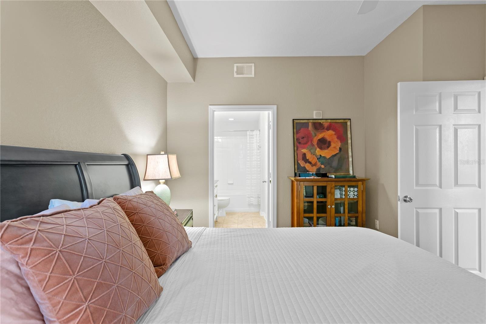 The primary bedroom with ensuite bathroom and walk in closet