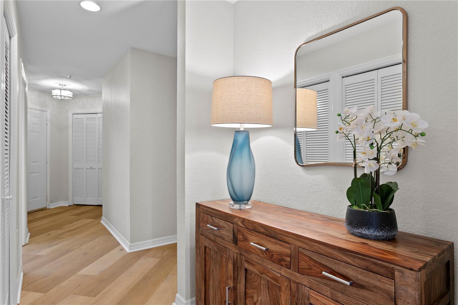 Located down the hallway are two additional bedrooms and a full bathroom.