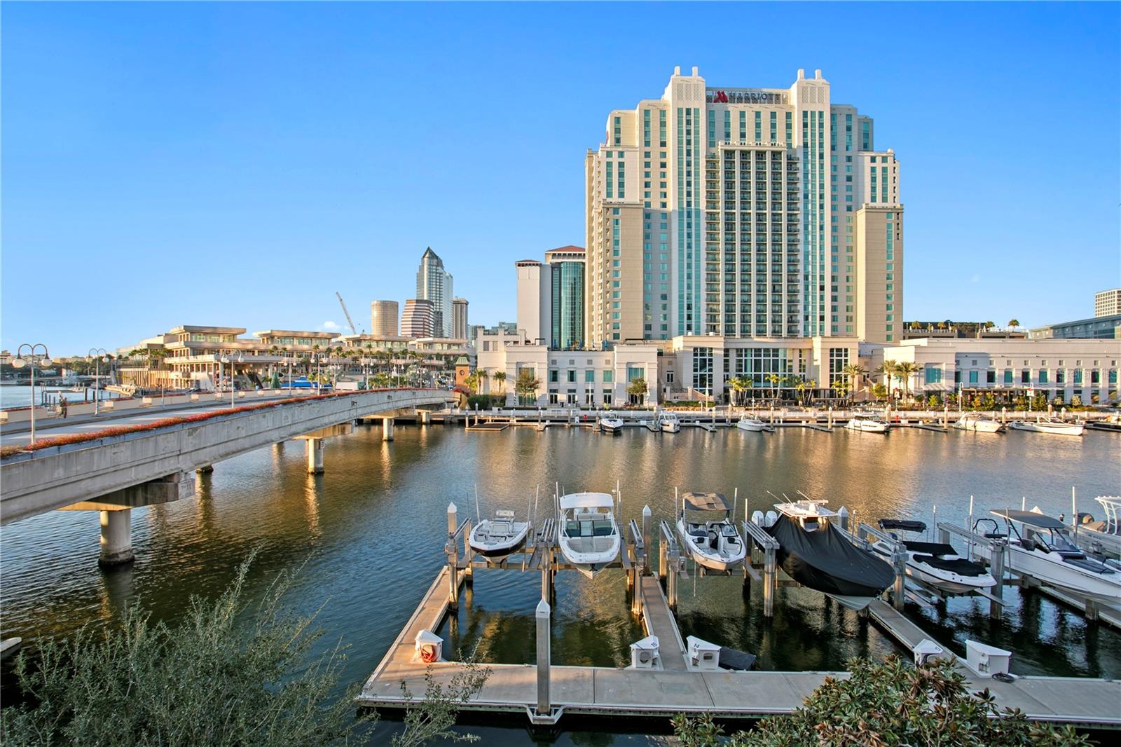 Sweeping views of the water, downtown skyline, and vibrant Water Street.