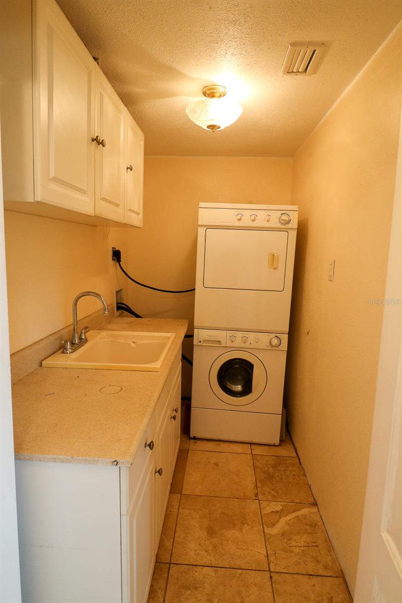 Laundry room off dining room.