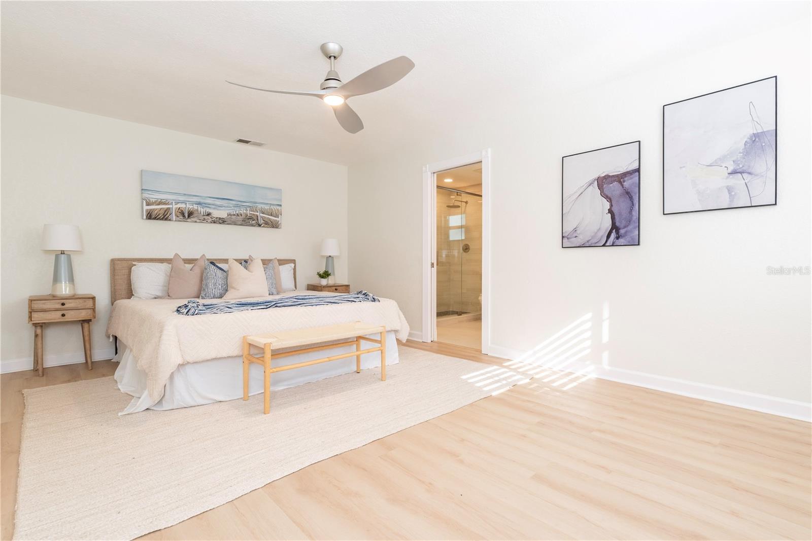 Primary bedroom with ensuite bathroom.
