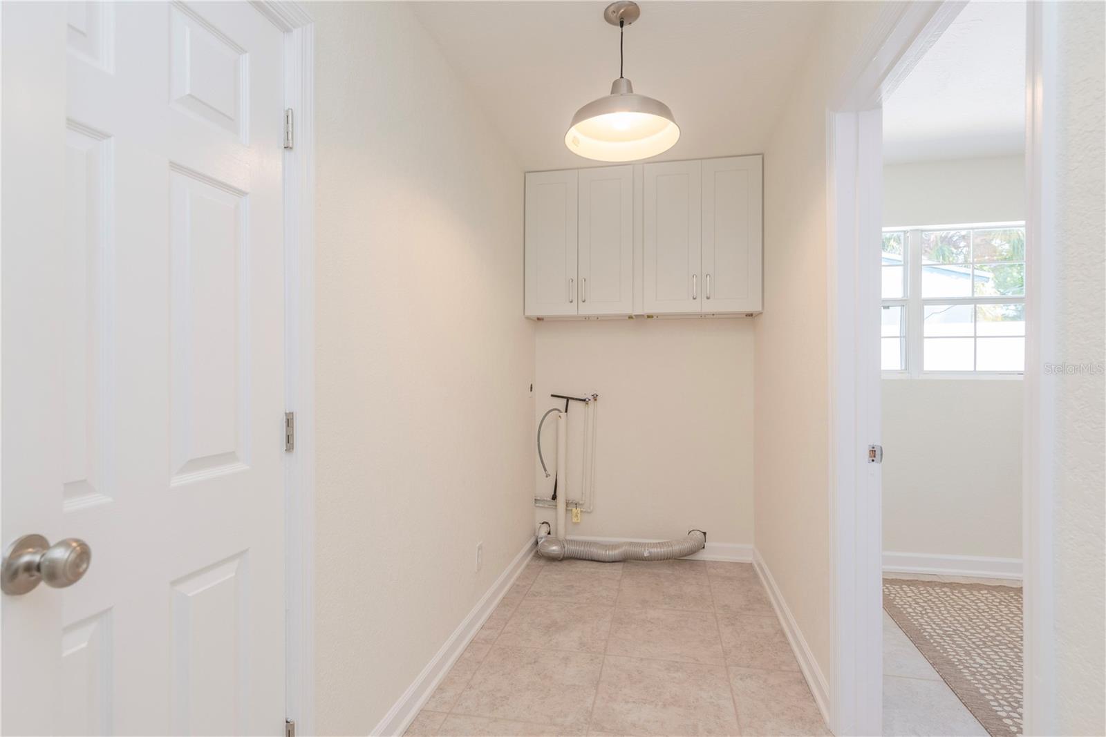 Inside laundry room.