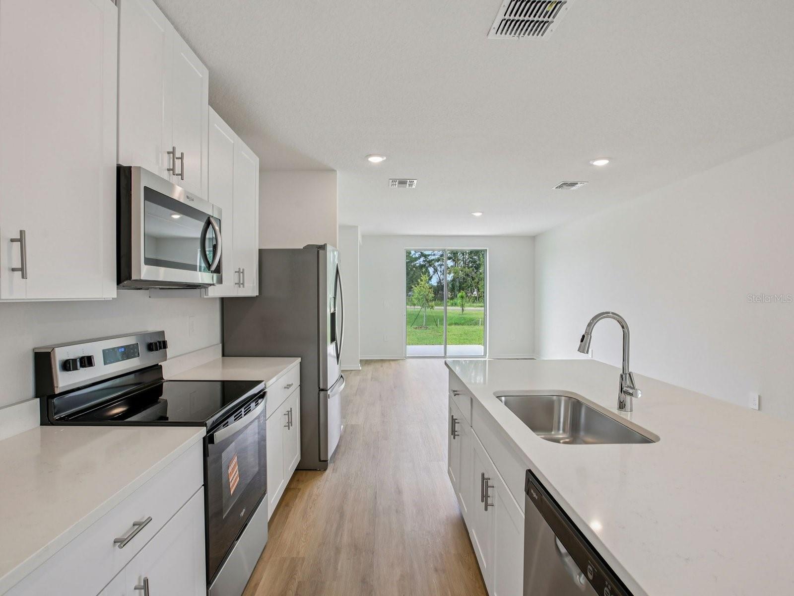 Interior photos are not of the actual home but are photos of the builder home with same floorplan with similar interior finishes and features.