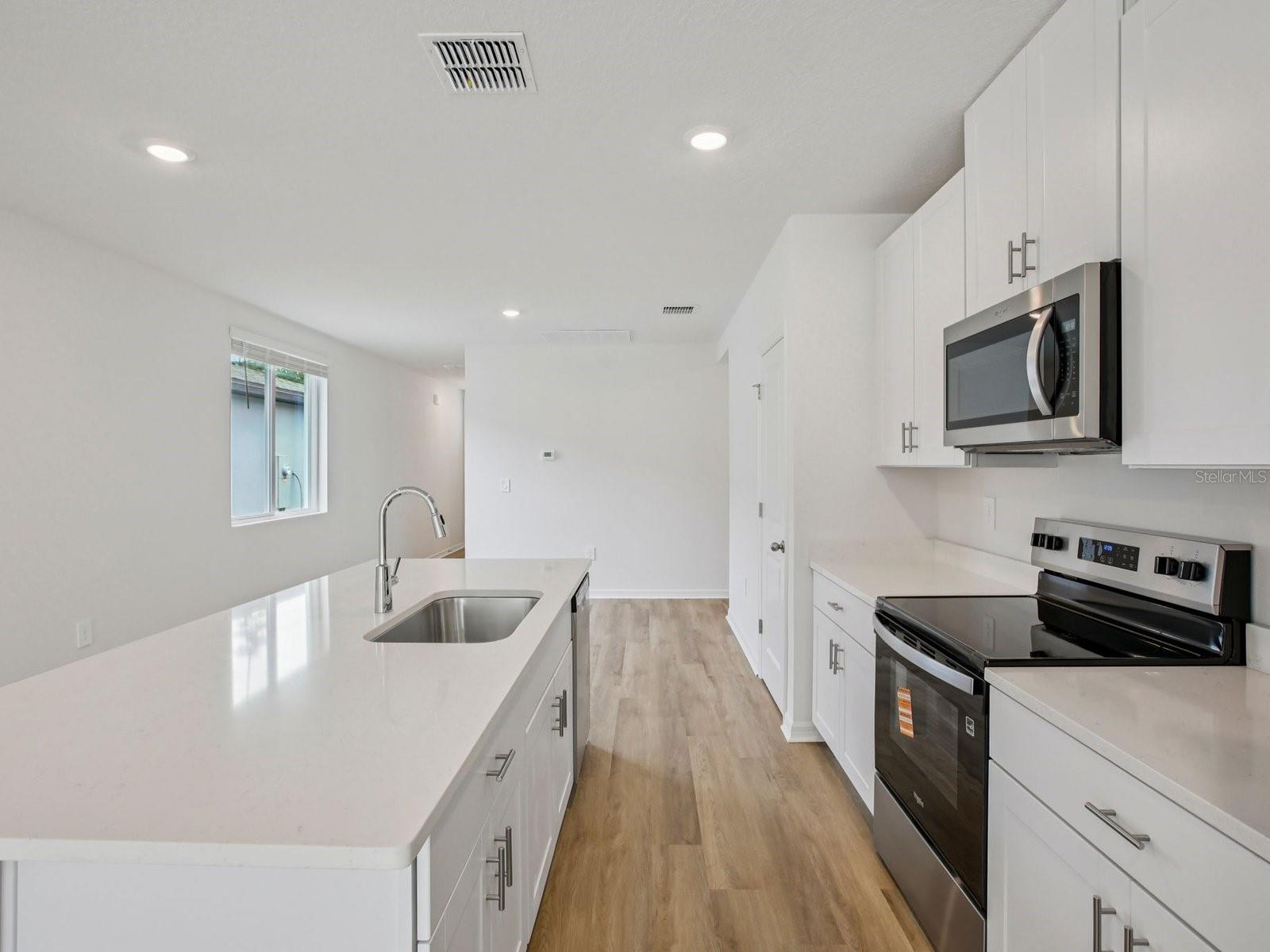 Interior photos are not of the actual home but are photos of the builder home with same floorplan with similar interior finishes and features.