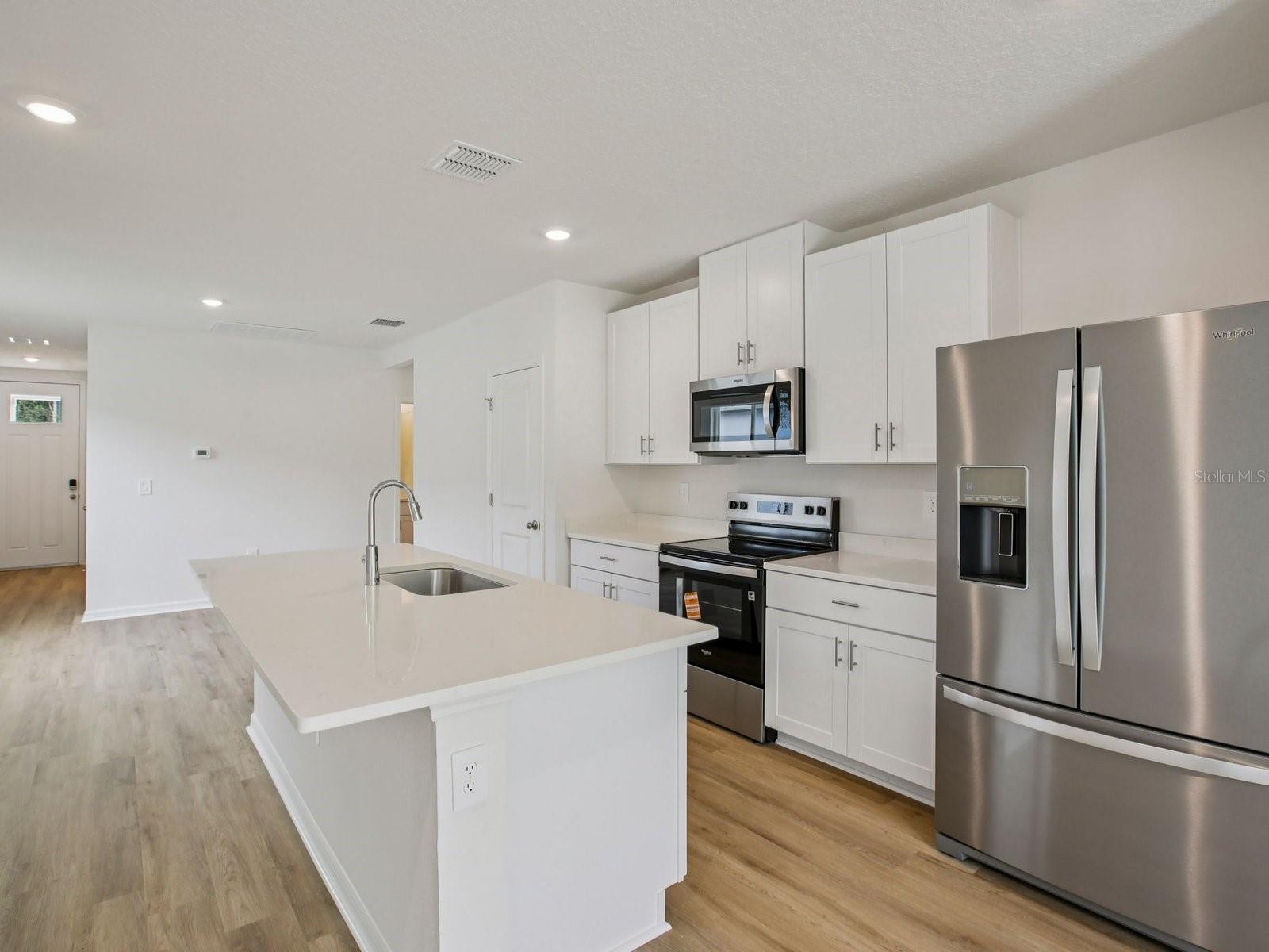 Interior photos are not of the actual home but are photos of the builder home with same floorplan with similar interior finishes and features.