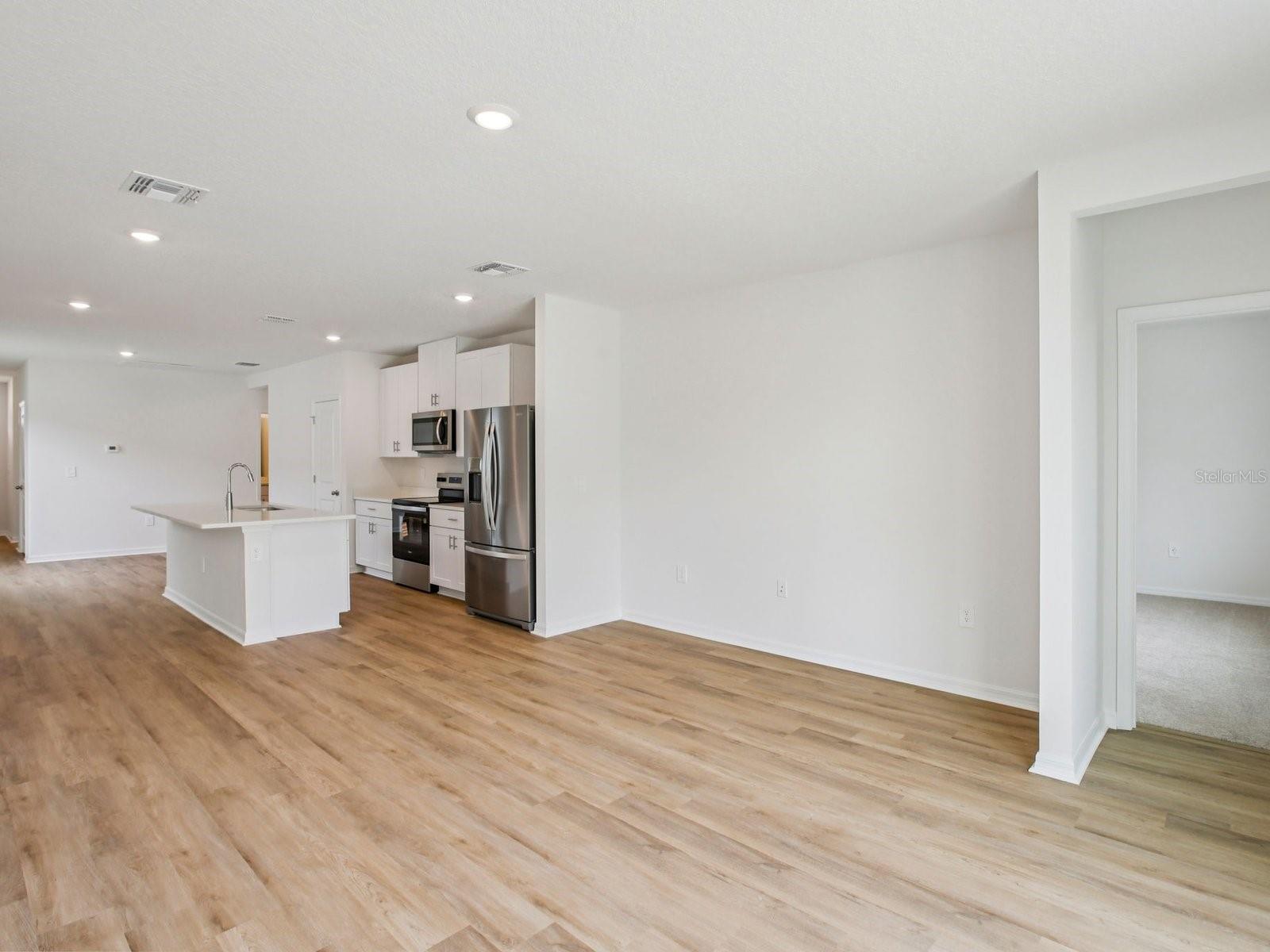 Interior photos are not of the actual home but are photos of the builder home with same floorplan with similar interior finishes and features.