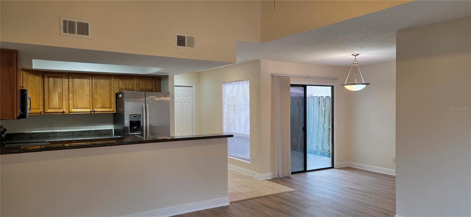 Dining room with access to rear fenced in patio