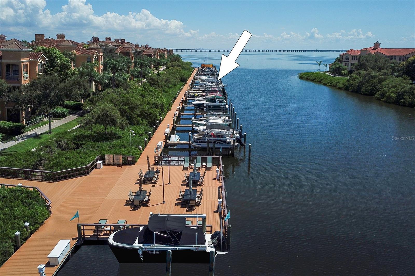 Boat Slip 50 is right off the marina walkway from the promenade between Building 11 and 12 to the common area catwalk of the marina - Entertainment pavilion at Building 9 is shown and continue east at the east end of  Building 11 to Boat Slip 50