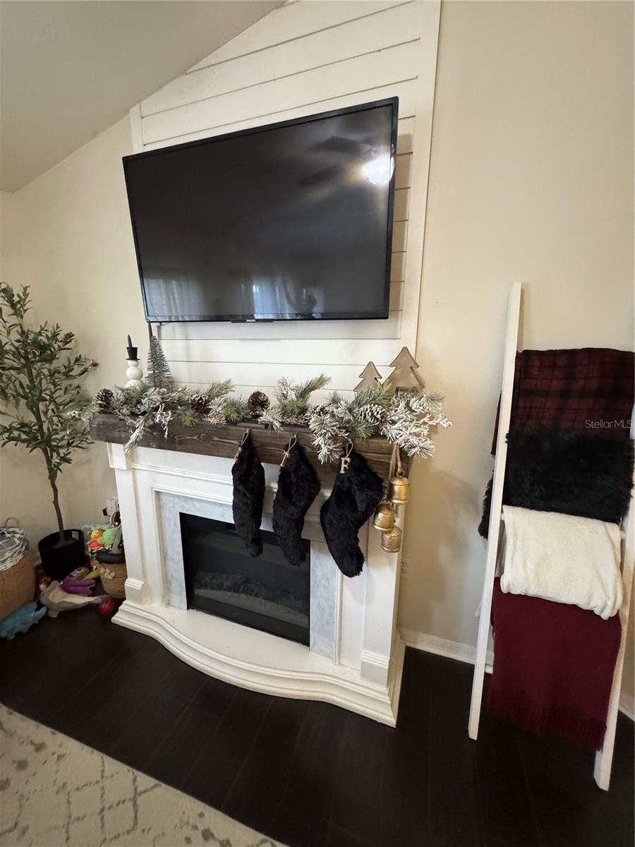 Electric fireplace and TV above.