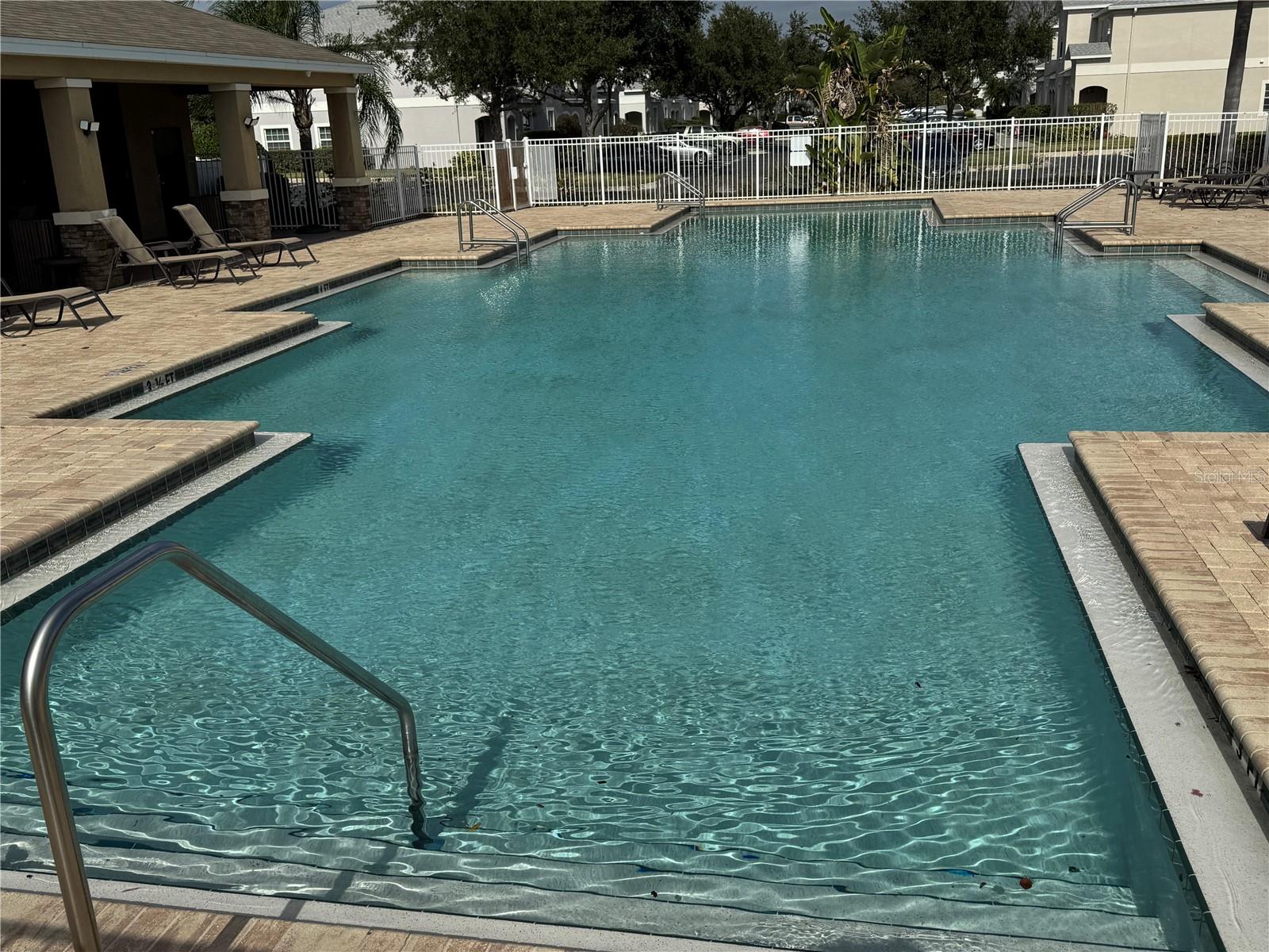 Immense pool with steps to enjoy your Florida sun