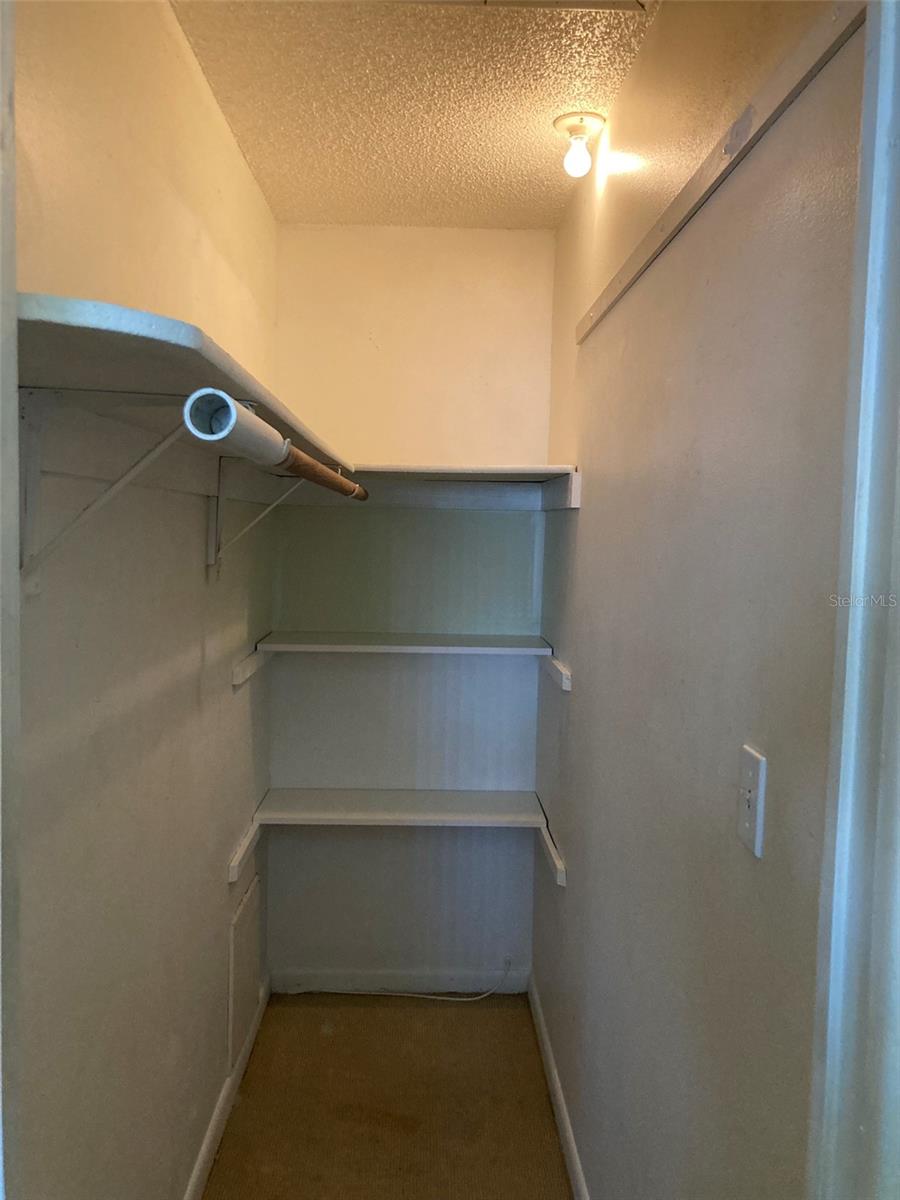 Walk in closet in the bedroom