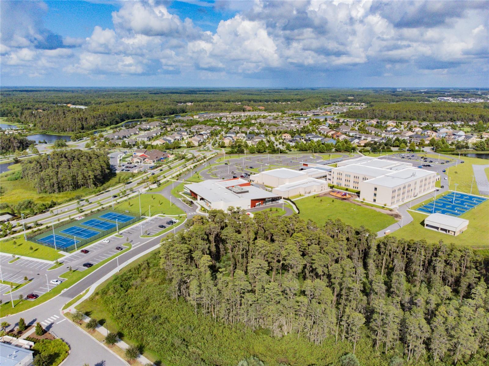 The Starkey Ranch K-8 campus, included in this viewpoint, is the Starkey Ranch Theatre Library Cultural Center. (with red accents)