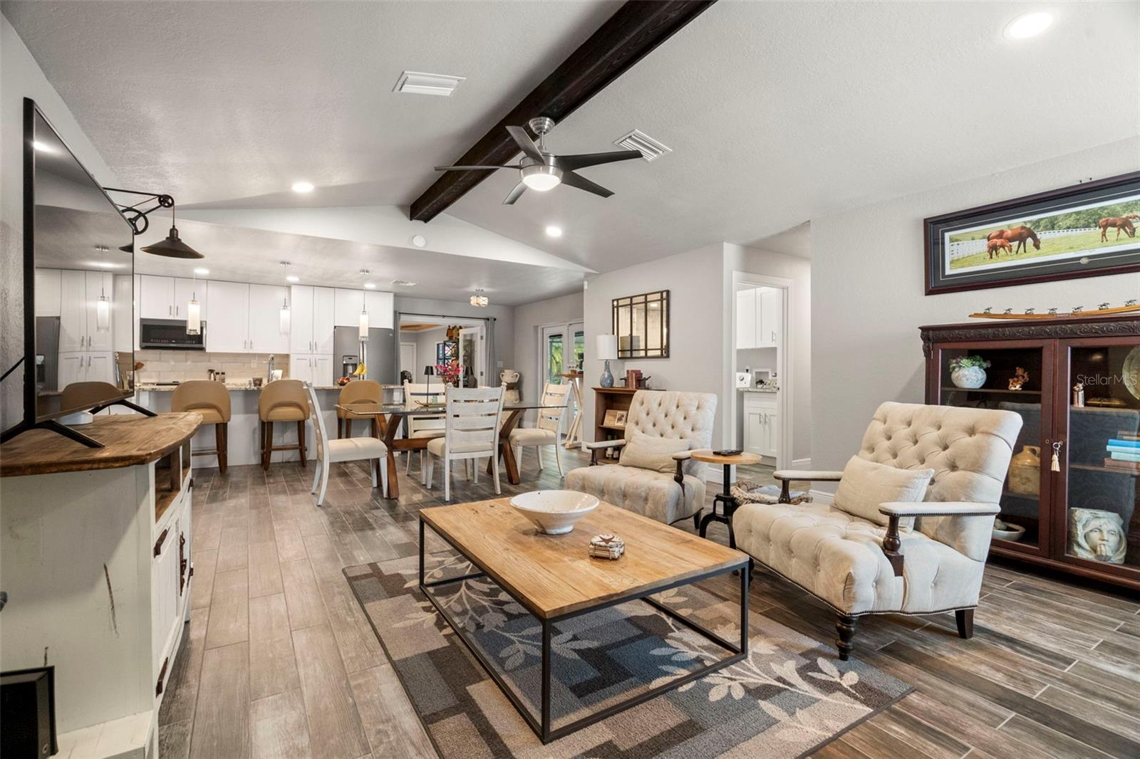 living room with view of laundry room