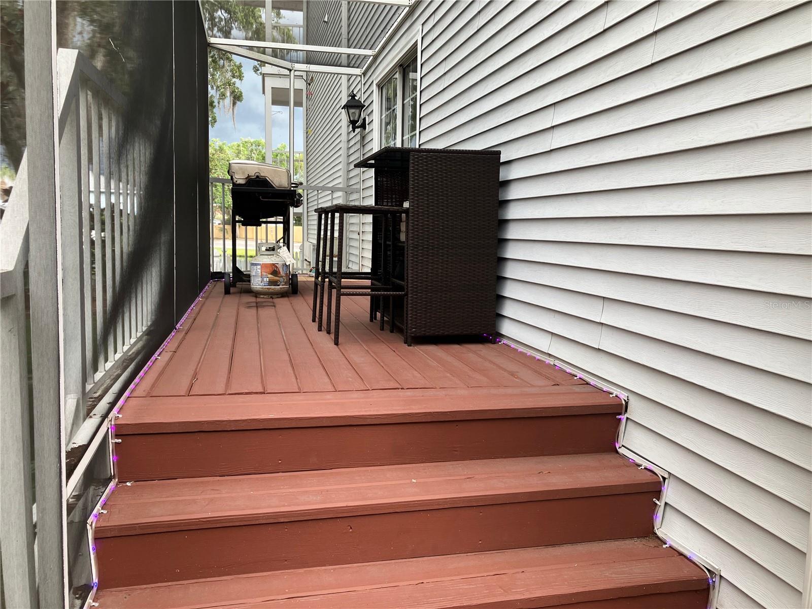 Extra space for outdoor grilling, next to the kitchen