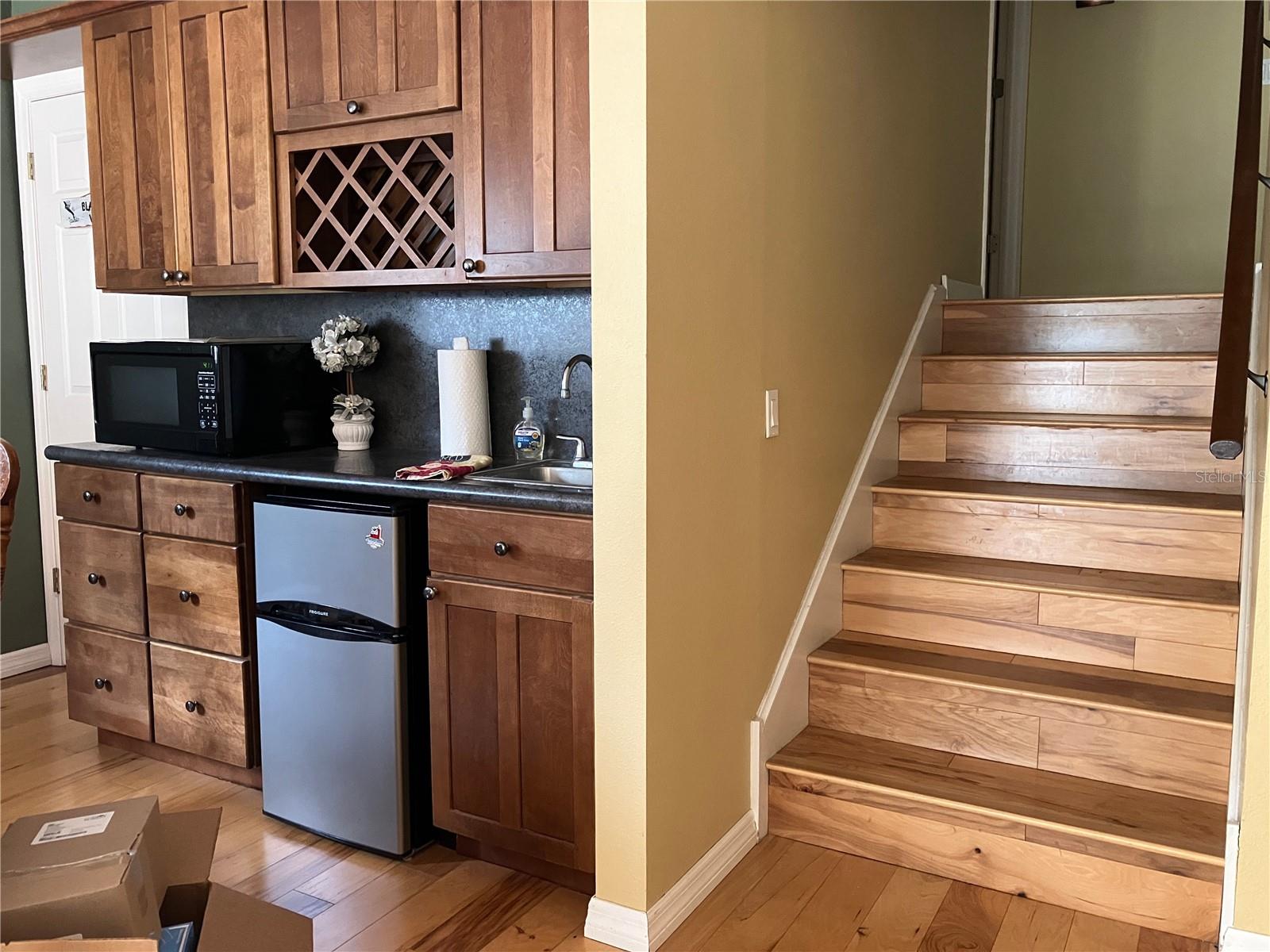 Mini bar area in the Great Room, beautiful flooring throughout