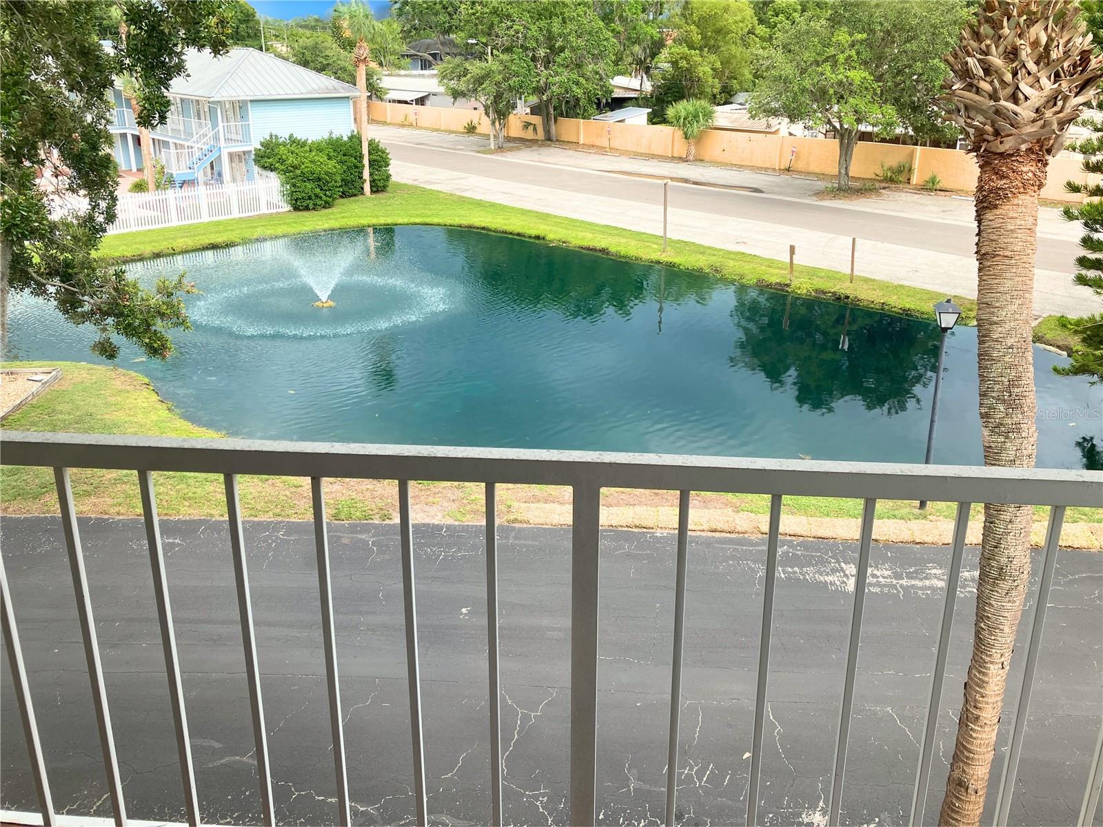 Pond view from the front balcony, multiple balconies to choose from.