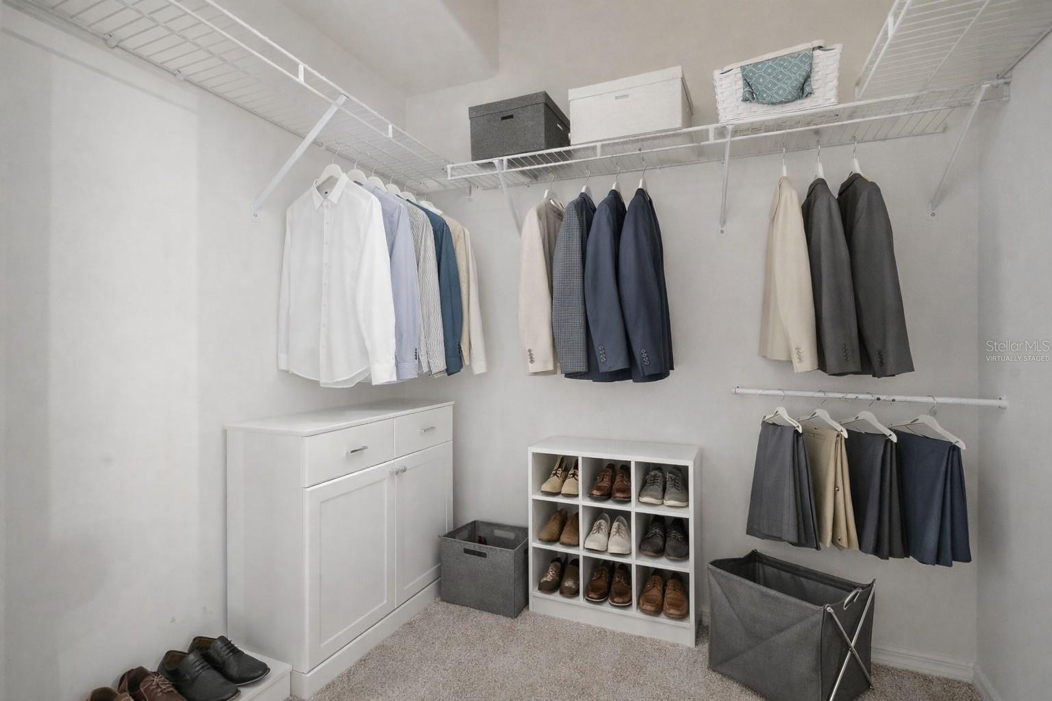 His Walk-In Closet - Virtually Staged