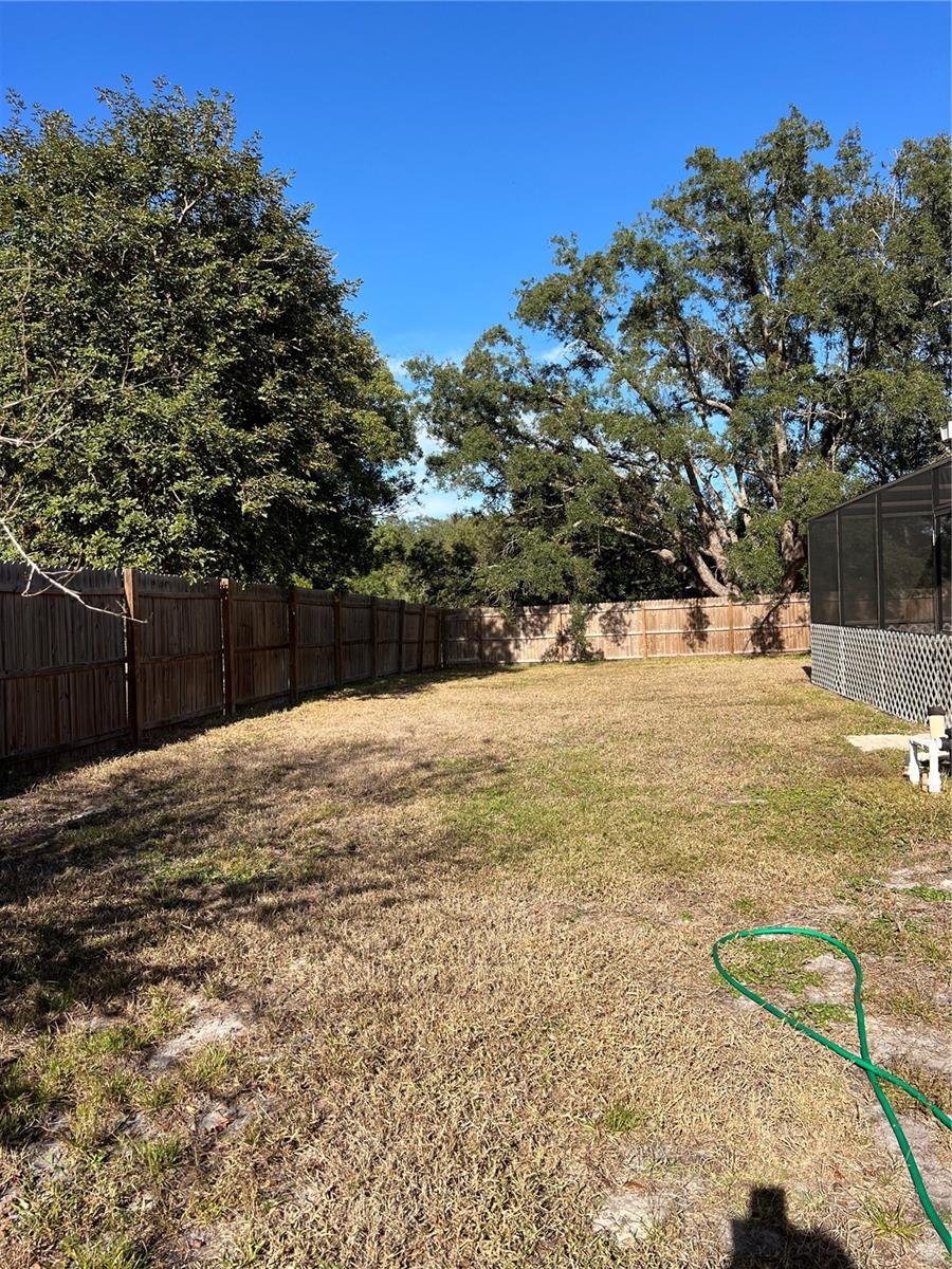 FENCED BACK YARD