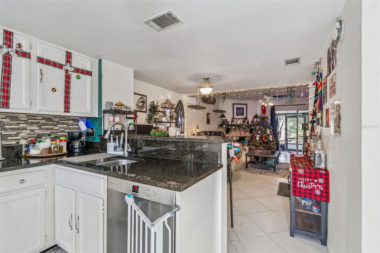 Kitchen view to Dining and Living Rooms