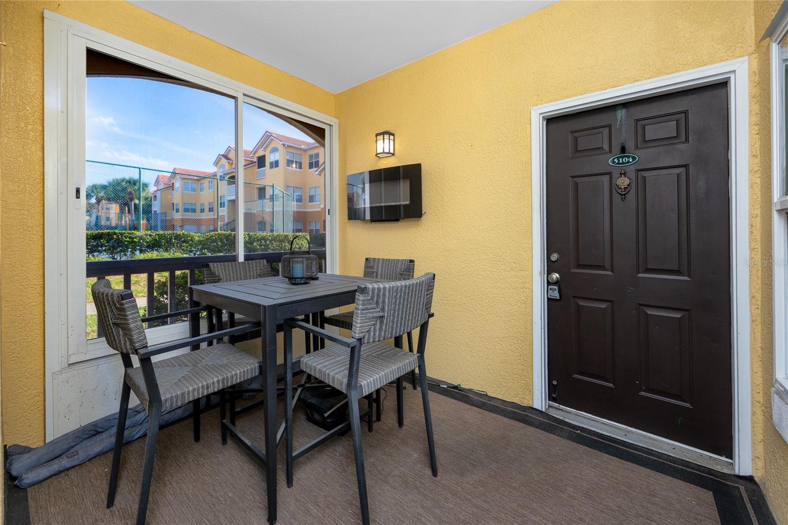 Enclosed Porch with Courtyard Views